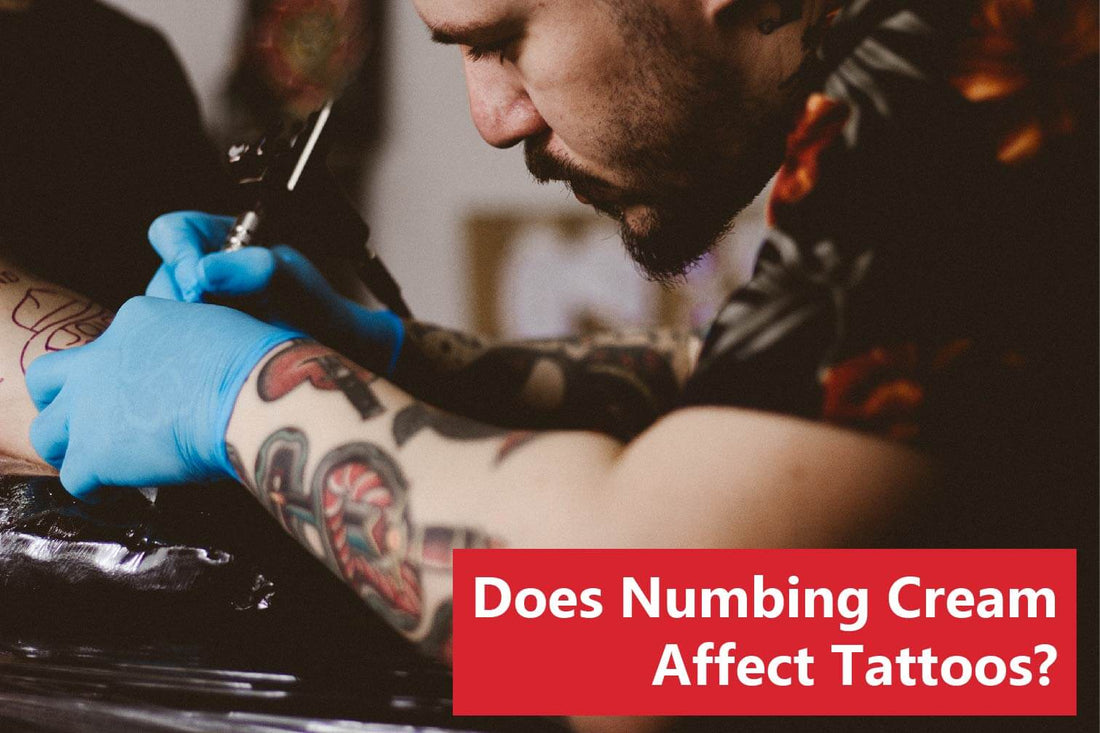 tattoo artist using a numbing ink on client